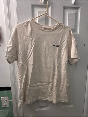 NORDA Cream Short Sleeve Tee with Small 'norda' Chest Logo